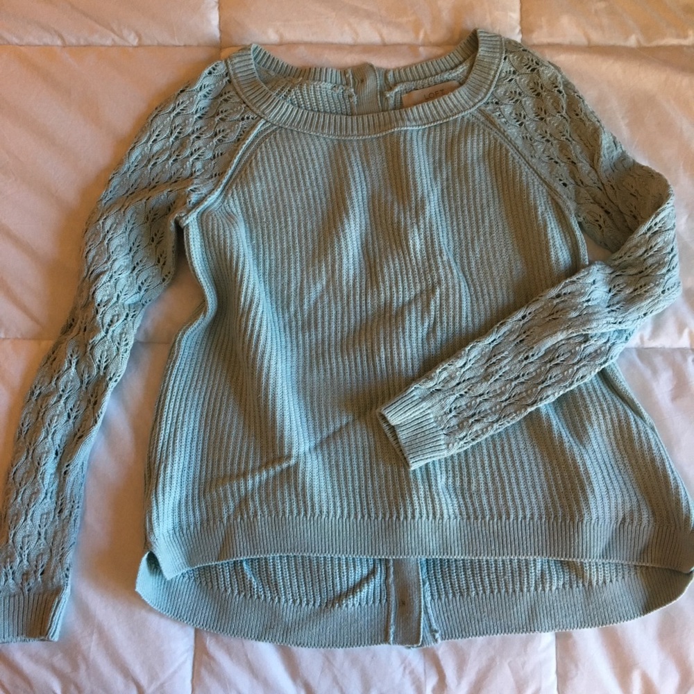 Button back sweater.